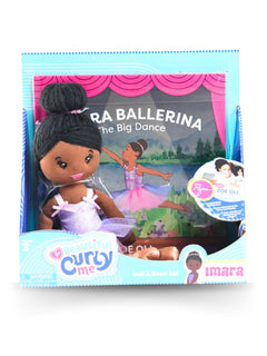 Imara Ballerina plush doll beside her storybook